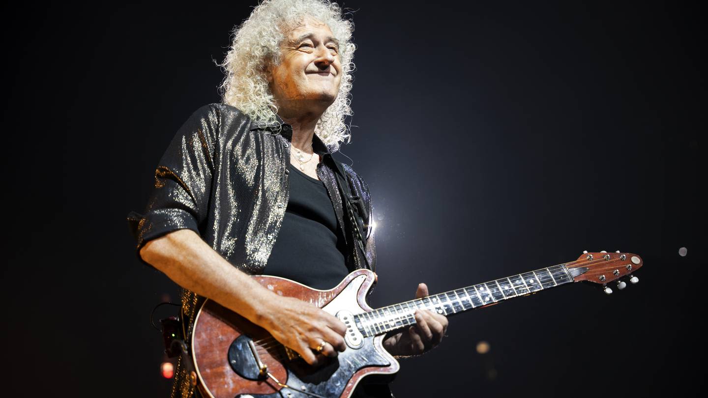 Queen guitarist Brian May says he had a 'minor stroke' but can still play