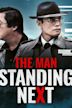 Das Attentat – The Man Standing Next