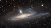 Dark energy camera reveals galaxies caught in a cosmic 'tug of war' (photo)