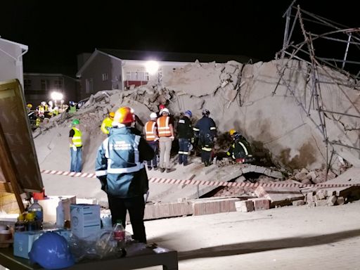 At least six dead, dozens missing in South African building collapse