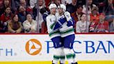 Lindholm scores two in Canucks debut in 3-2 win over Hurricanes