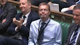 Applause for 'bionic MP' returning to Parliament