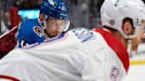 The Colorado Avalanche's Valeri Nichushkin looks over at the Montreal Canadiens' Mike Matheson outside of the face-off circle in the first period at Ball Arena...