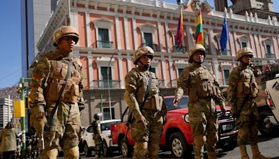 Coup attempt feared in Bolivia as troops surround presidential palace