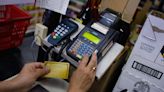 More Americans are maxing out their credit cards and falling behind on payments