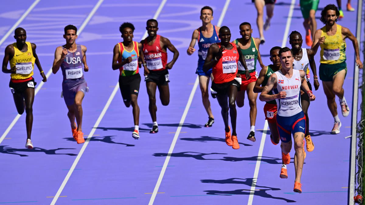 WATCH: Cameraman moseys onto Olympic track during men's 5000m race, nearly crashes into runners