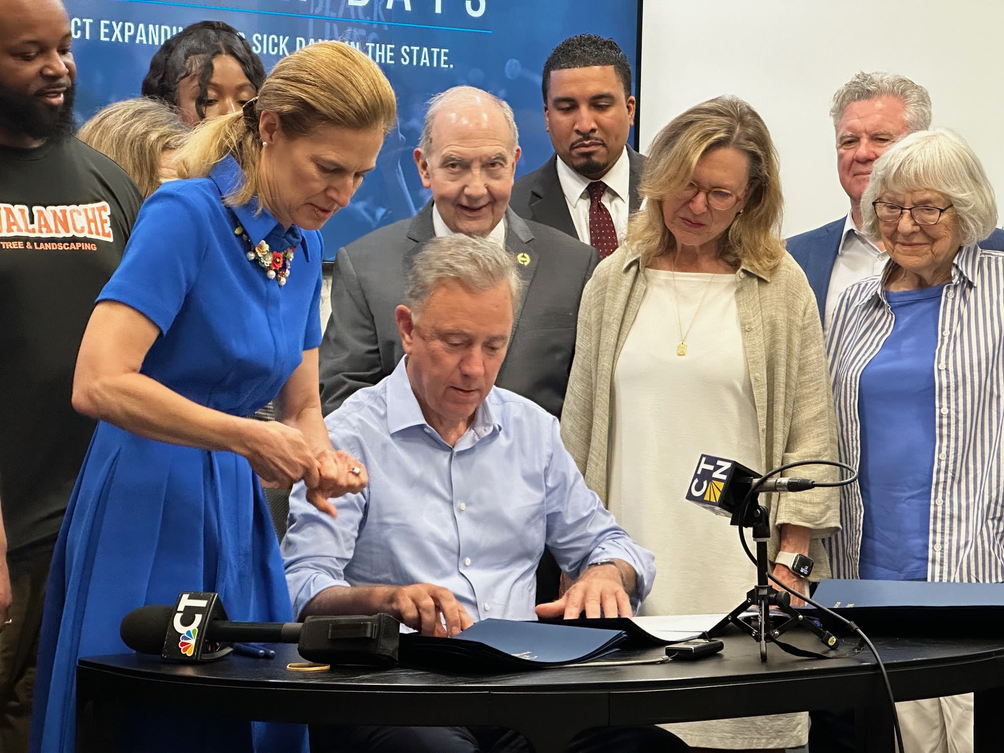 Lamont signs CT paid sick leave law; ceremony marks wedge issue