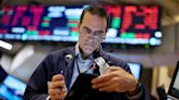 S&P 500, Nasdaq slide, while Dow ends higher on mixed earnings picture