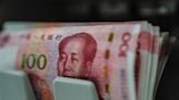 China Cuts Yuan Fix to Lowest Since January Amid Strong Dollar