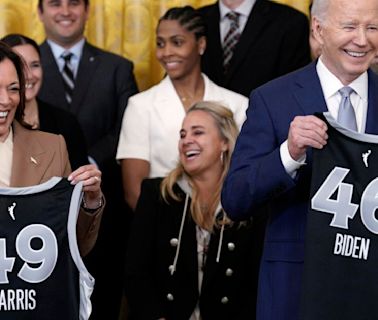 U.S. President Joe Biden and Vice President Kamala Harris are presented jerseys as they welcome the Las Vegas Aces to celebrate their record-breaking season and victory...