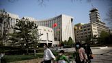 China tightens requirements on classifying banks' asset risks
