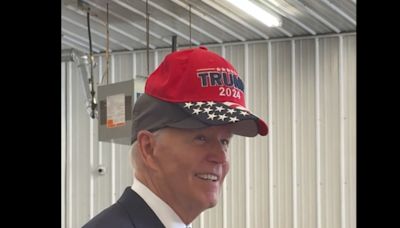 'No eating dogs and cats,' Biden jokes as he wears Trump 2024 hat