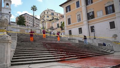 WATCH: Spanish Steps painted red in protest against femicides