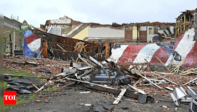 Storms flood the Ozarks and strand drivers in Toronto. New York community is devastated by tornado - Times of India