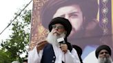 Pakistan arrests top leader of radical party on charge of ordering the killing of the chief justice