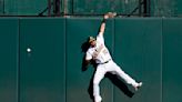 Kemp scores winning run on defensive misplay, A's beat M's