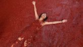 Food fight! Streets awash in tomato pulp during Spain’s Tomatina party