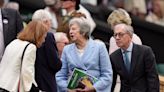 Theresa May and Romeo Beckham among spectators on drizzly day three of Wimbledon