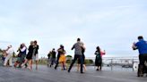 In summer's fleeting light on the Providence River, dancers flock to 'Guerrilla Tango'