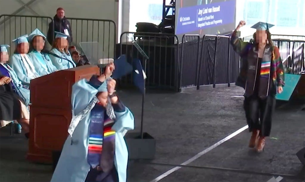 Columbia University graduate in zip ties rips diploma during ceremony amid Gaza protests