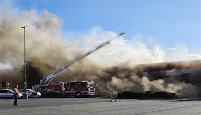 West Valley strip mall engulfed in flames, firefighter injured