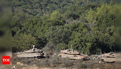 Israel strike kills 5 Syrian soldiers near Lebanon: state media - Times of India