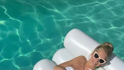 Tess Daly sends fans wild with addition to lounging pool snap amid 'Hollywood movie' remarks