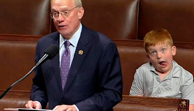 Congressman's son steals the show making silly faces behind dad during speech on the House floor