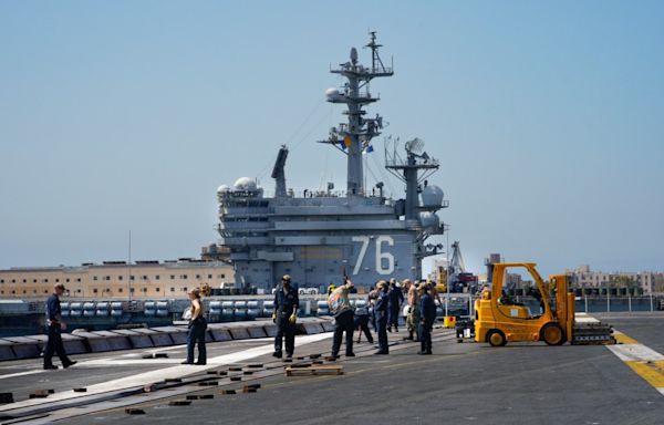 Delicate ballet unfolds in San Diego Bay as 2 aircraft carriers swap assets and people