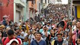 Mexican and Guatemalan presidents meet at border to discuss migration, security and development