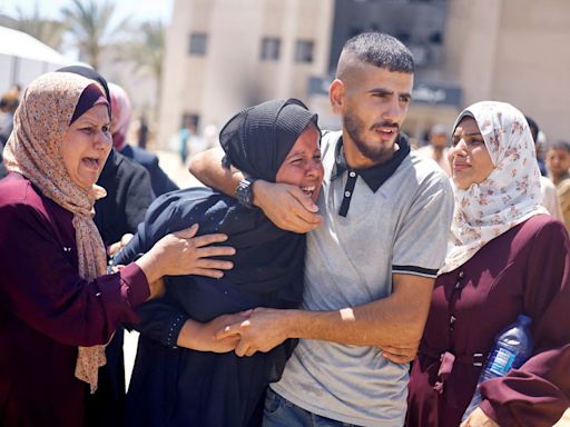 Dozens dead in Israeli strike as claims Hamas military commander targeted