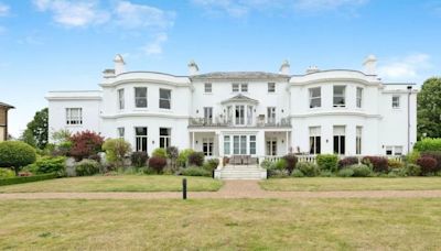 The two-bed flat hiding in a Surrey mansion accessed by grand staircase