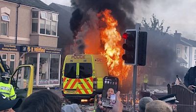 Police clash with an unruly crowd gathered near the site of UK stabbing attack that killed 3 girls