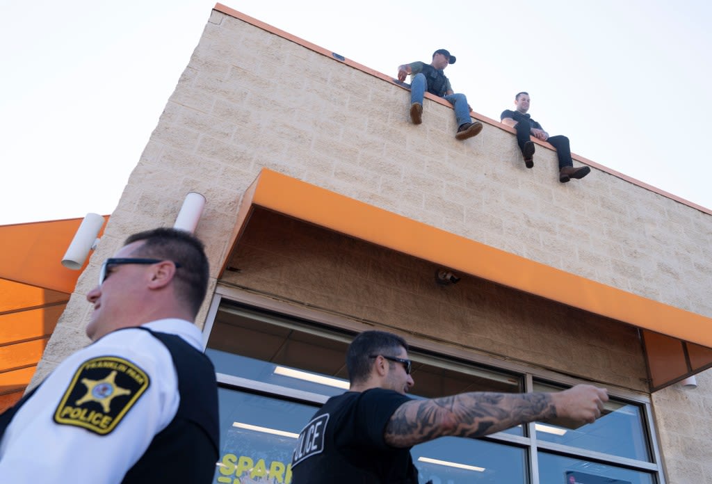 Franklin Park cops take to the Dunkin’ Donuts rooftop, raise $4K for Special Olympics Illinois