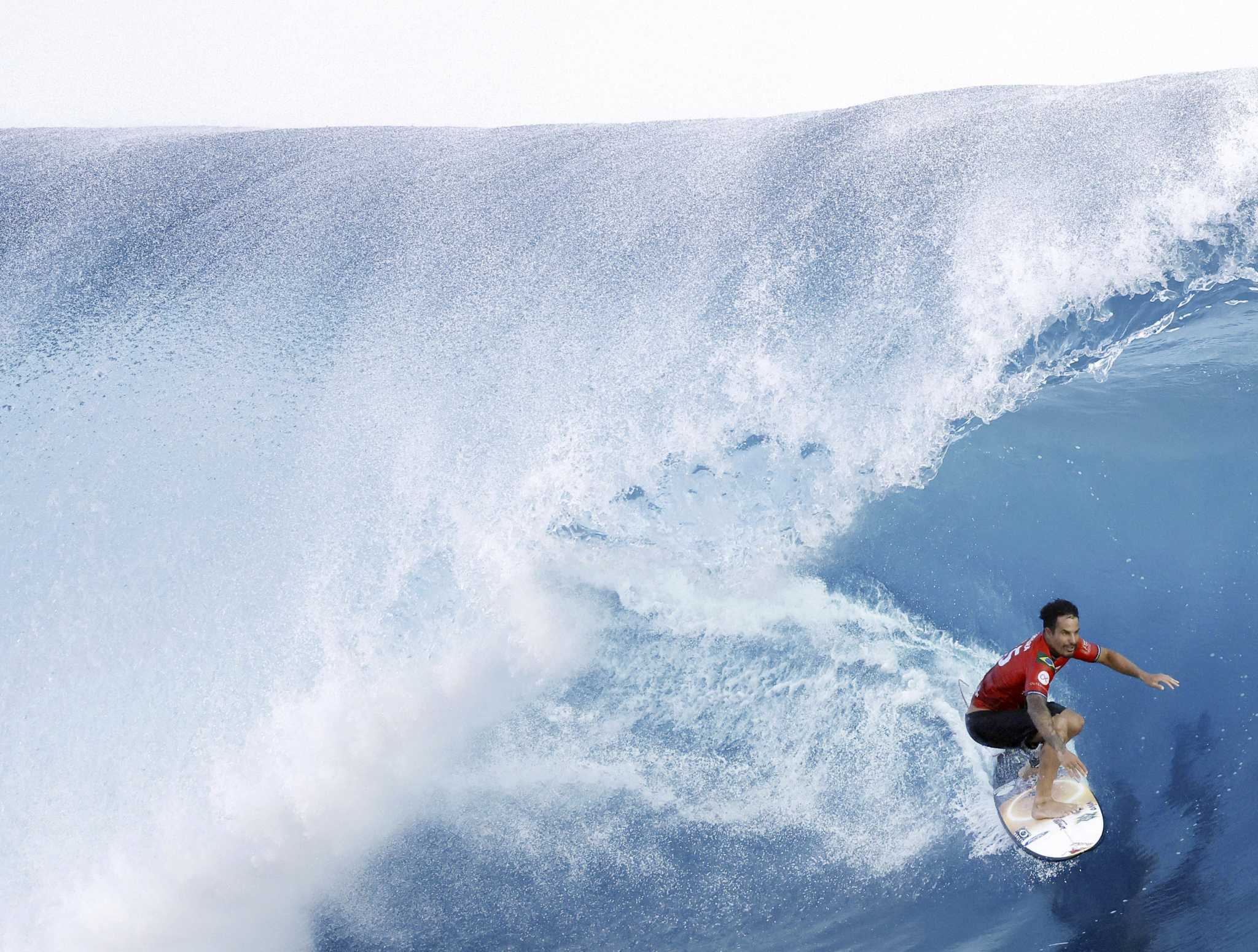 Surfers get 'best waves of our lives' at dress rehearsal for Olympic venue in Tahiti