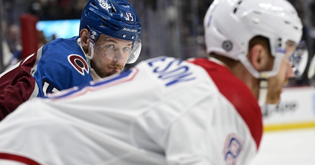 The Colorado Avalanche's Valeri Nichushkin looks over at the Montreal Canadiens' Mike Matheson outside of the face-off circle in the first period at Ball Arena...