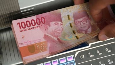 Indonesia hikes rate to arrest rupiah slide