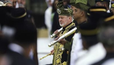 Malaysia honors new king in coronation ceremony marked by pomp and cannon fire