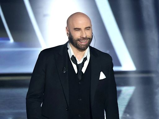 Italy State TV Fined for Travolta’s Sanremo Chicken Dance Shoes