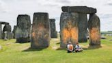 UK Climate Protesters Cover Stonehenge In Orange Paint Ahead Of Election