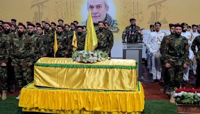 Hezbollah fires over 200 rockets into Israel after killing of senior commander