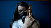 Mexican musician finds refuge in saxophone after acid attack