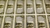 Dollar up as traders await Fed clues; sterling rises