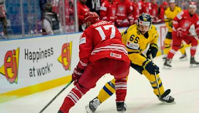 Penguins defenseman Erik Karlsson leads Sweden past Poland