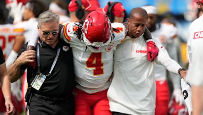 Chiefs WR Rashee Rice carted off with knee injury vs. Chargers after colliding with Patrick Mahomes: 'It's not good'