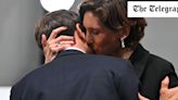 Pictured: ‘Curious kiss’ between Macron and French sports minister