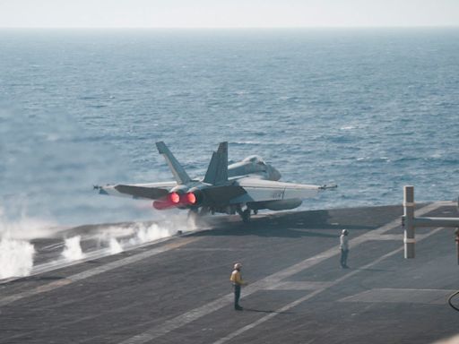 A US Navy carrier strike group locked in a Red Sea battle has fired over 500 munitions fighting the Houthis