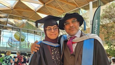 Father and daughter graduate together from the same university