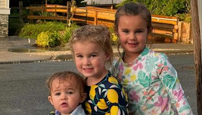 Jason and Kylie Kelce Share a Sweet Snap of Their 3 Girls Posing Under a Rainbow