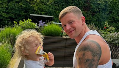 Adam Peaty marks sweet milestone by sharing photo of rarely-seen son George with girlfriend Holly Ramsay